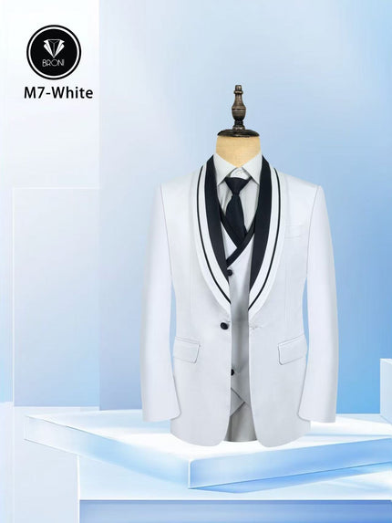White tuxedo suit with shawl lapels, black vest and bow tie