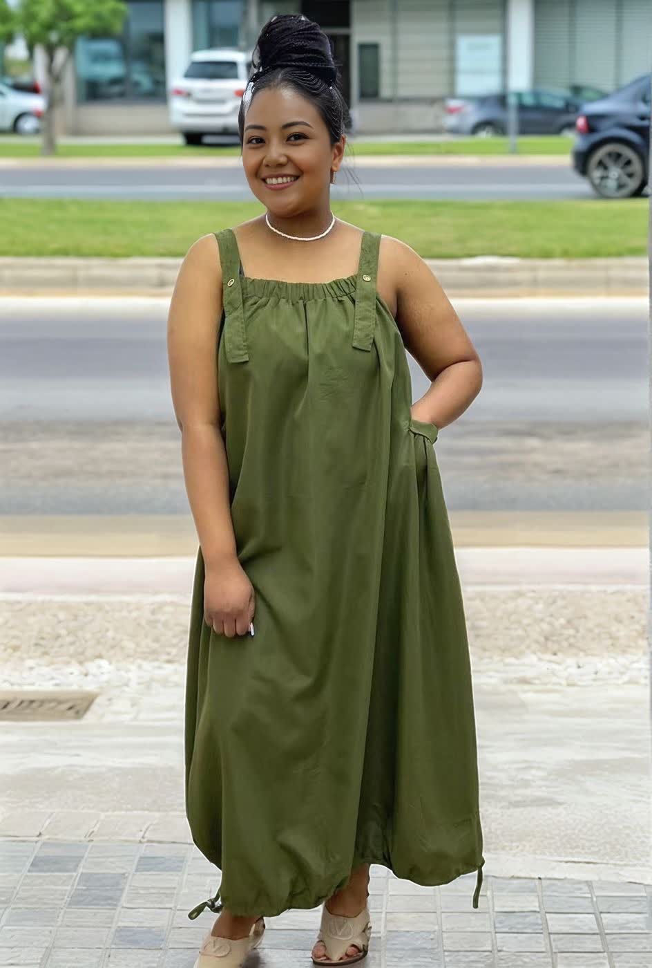 Army green utility maxi dress with wide straps and adjustable drawstring waist