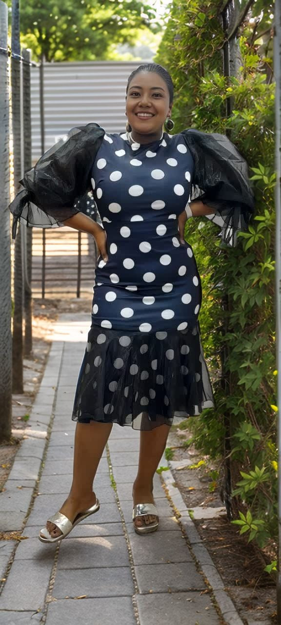 Polka dot mesh dress with puff sleeves, dark base and white dots