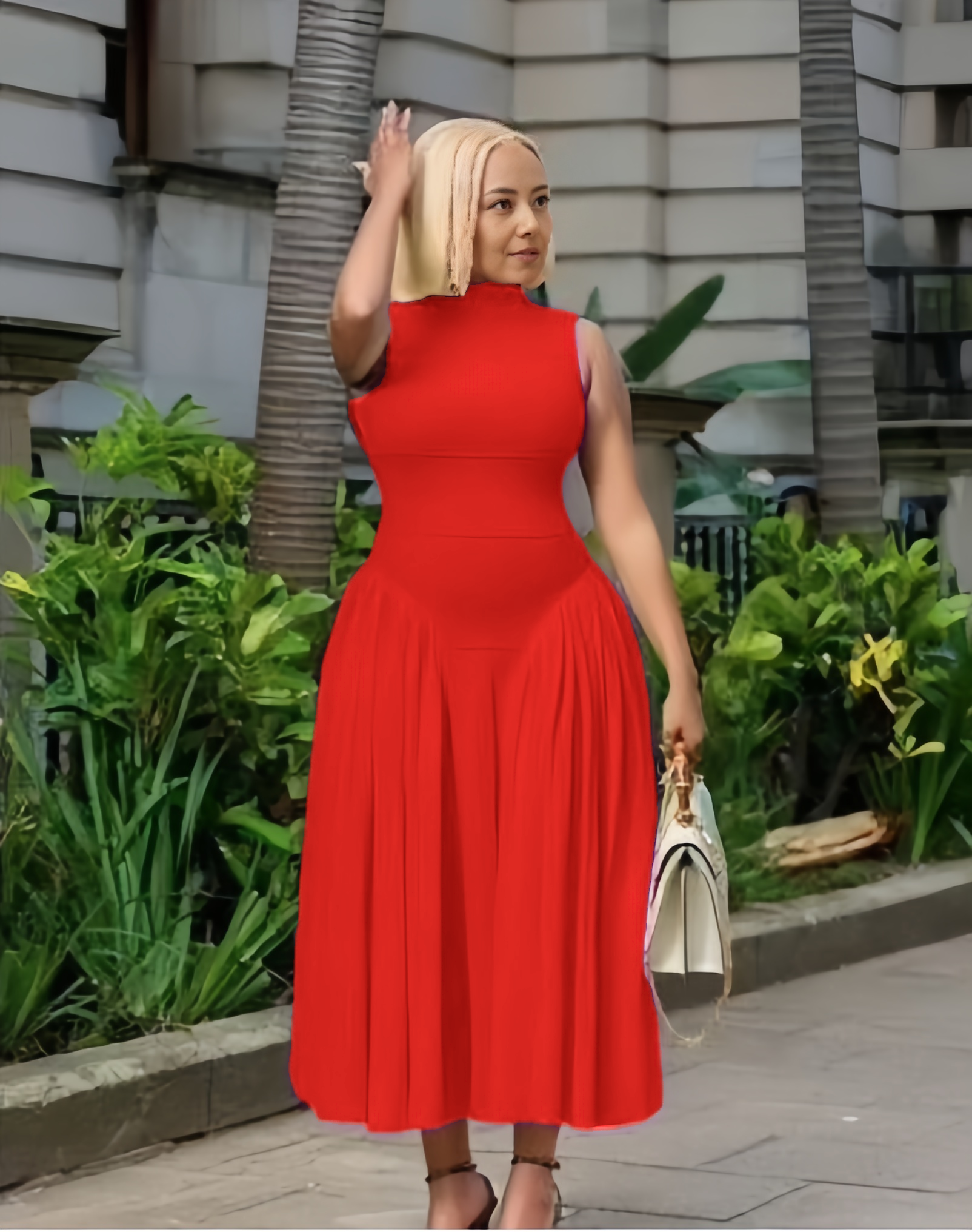 Red A-line midi dress with defined waist, sleeveless high neck, pleated skirt