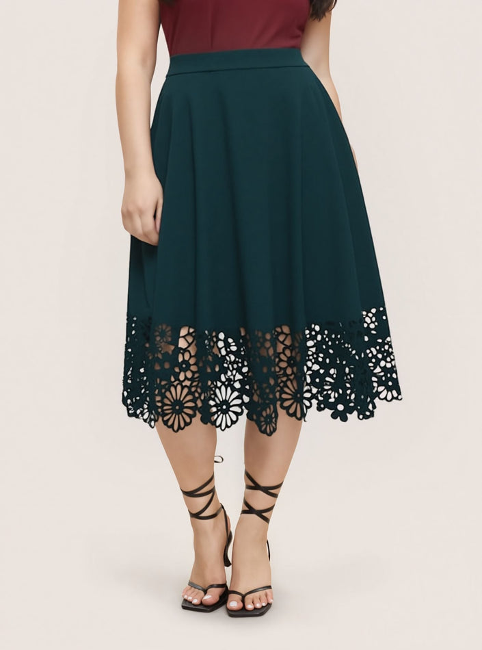 High-waist midi skirt in dark green with scalloped lace hem and floral cutwork