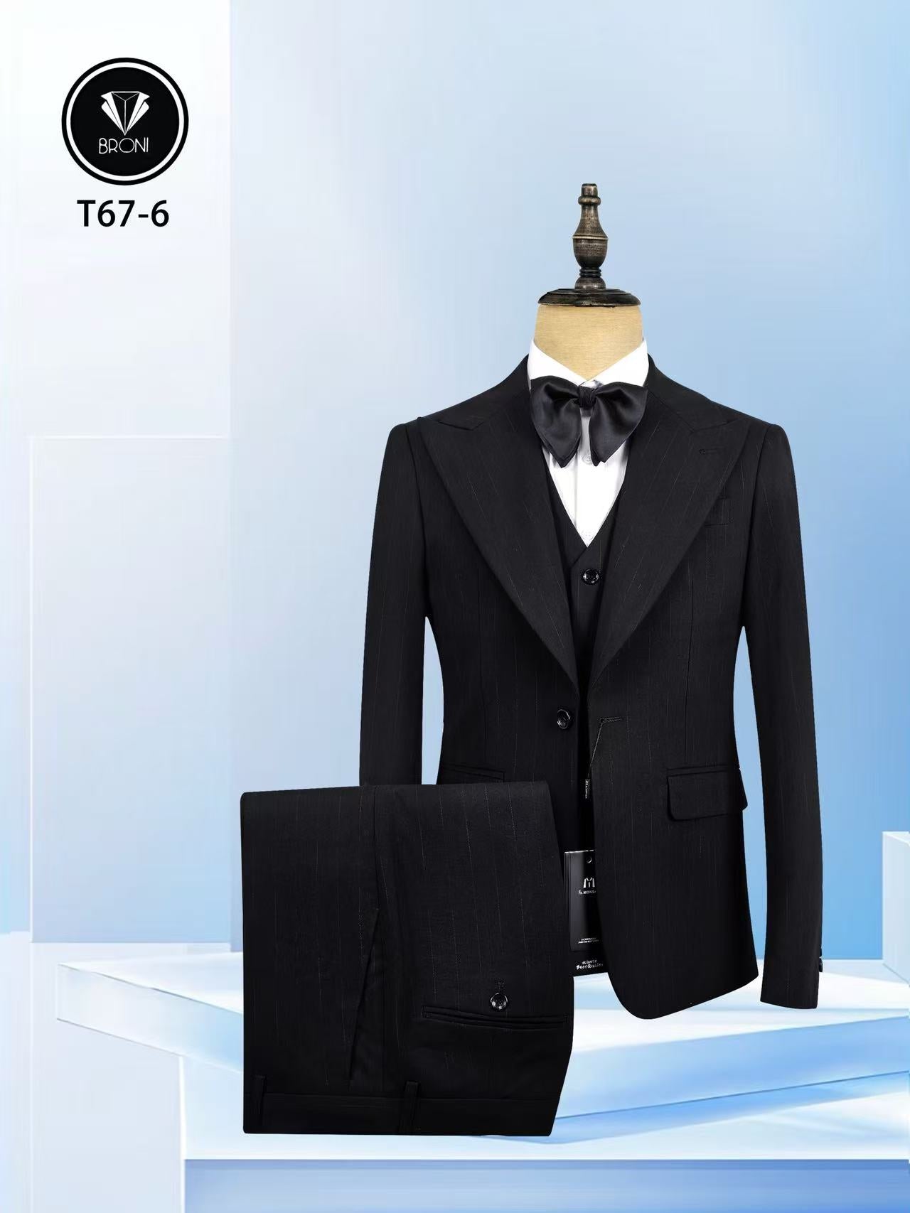 Men's black pinstripe peak lapel suit jacket with matching vest and trousers