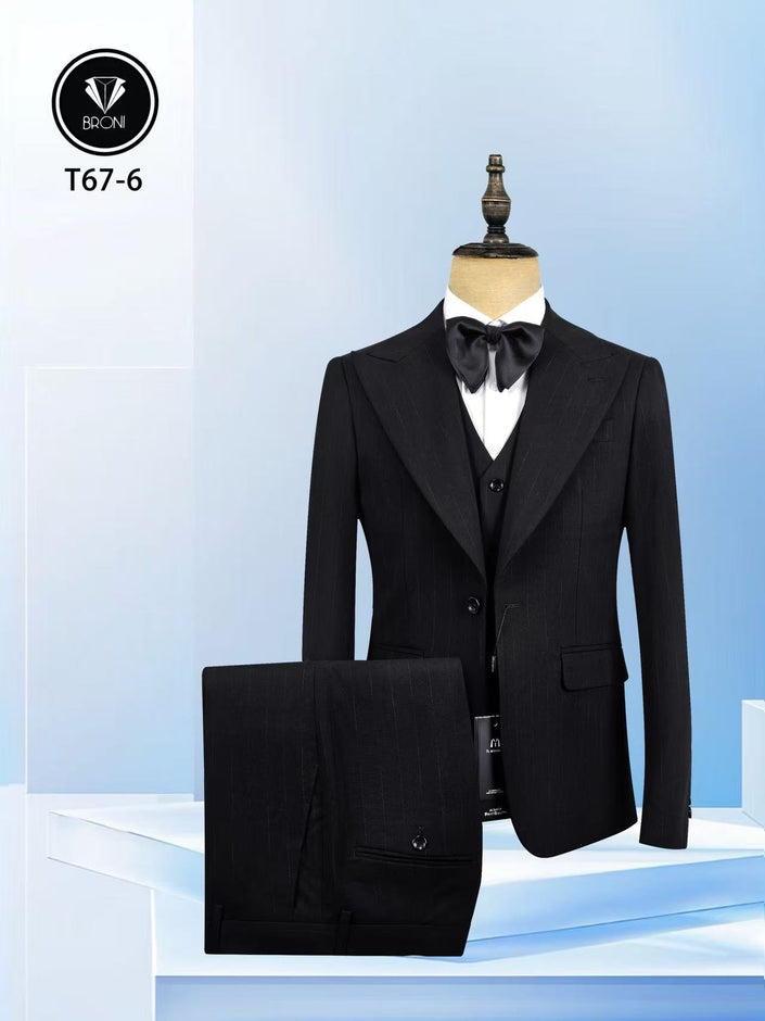 Men's black pinstripe peak lapel suit jacket with matching vest and trousers