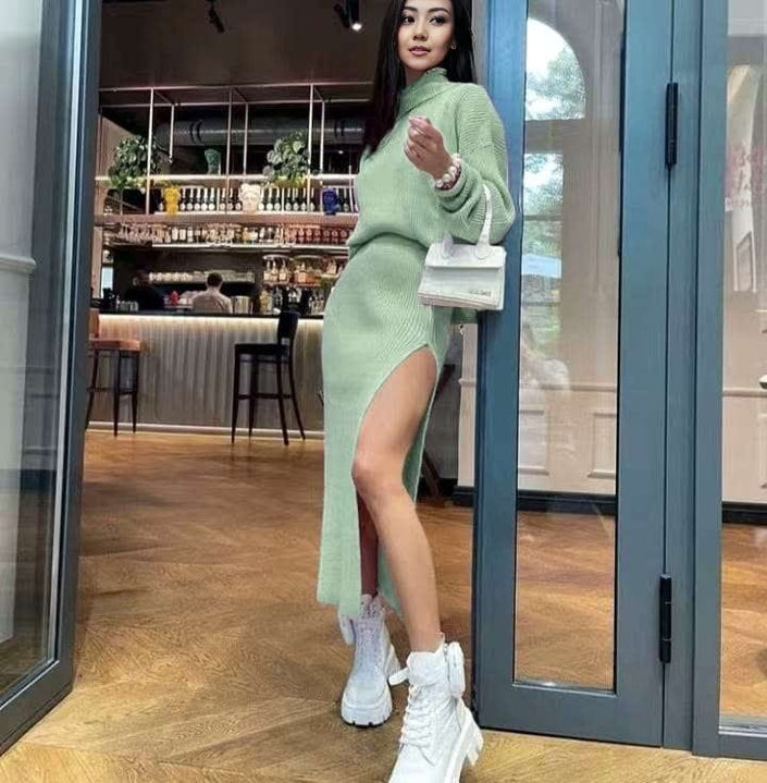 Mint green long-sleeve knit midi dress with front slit and bodycon fit