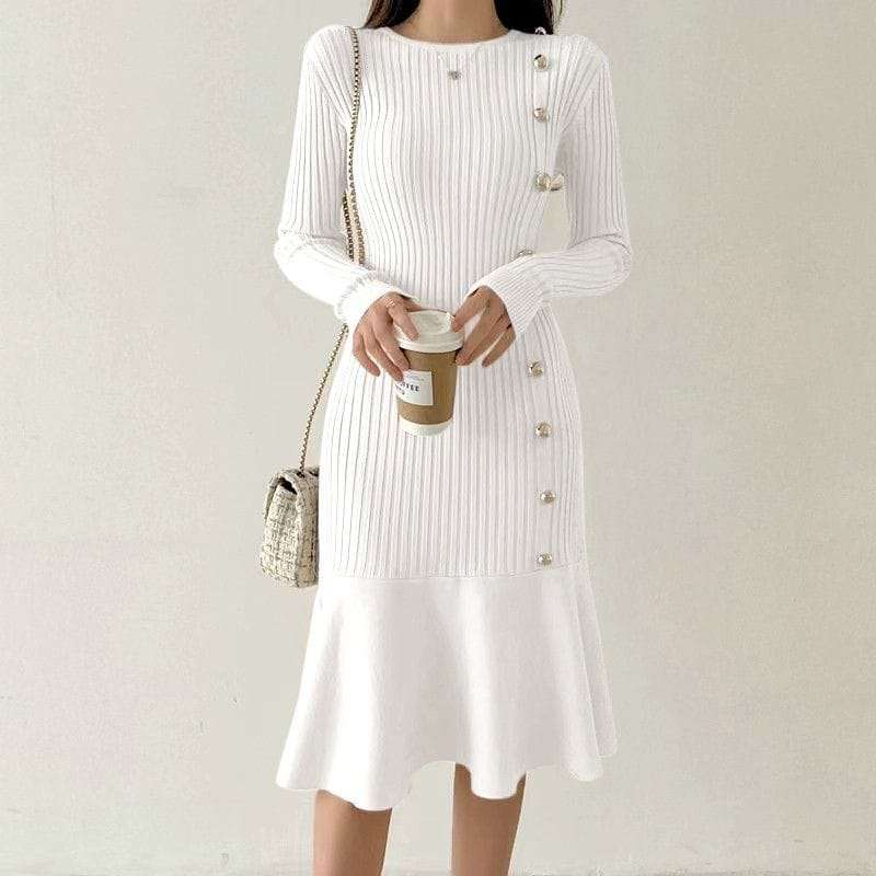 White ribbed knit midi dress with long sleeves and pearl buttons.