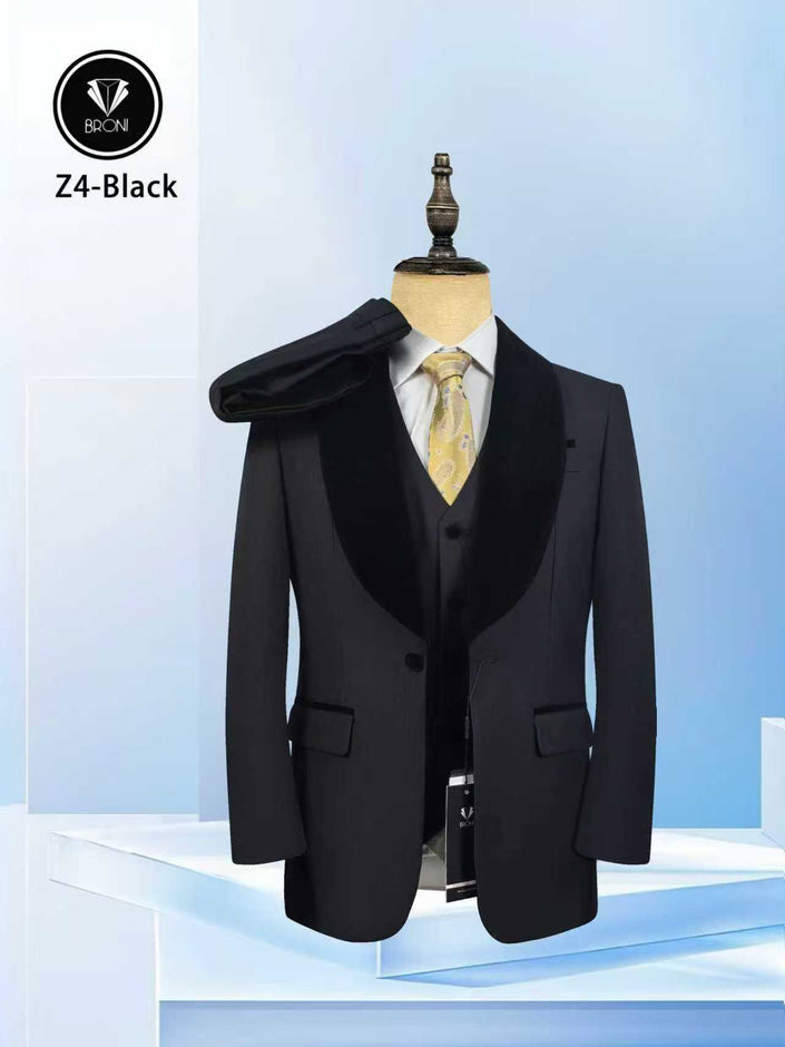 Black tuxedo suit with shawl lapel jacket, velvet finish, and waistcoat